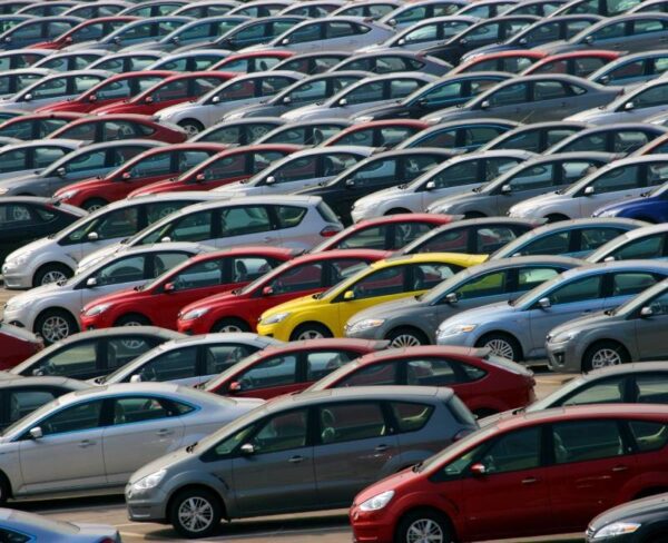 Various cars in a parking lot